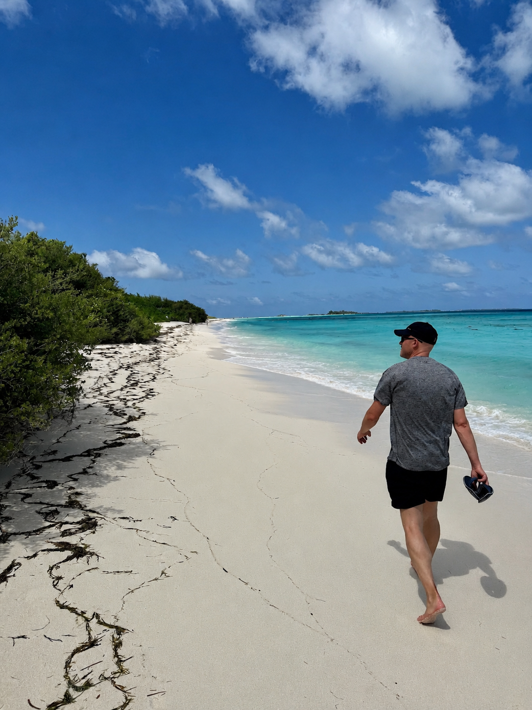 Jens Oliver Barner an einem tropischen Strand